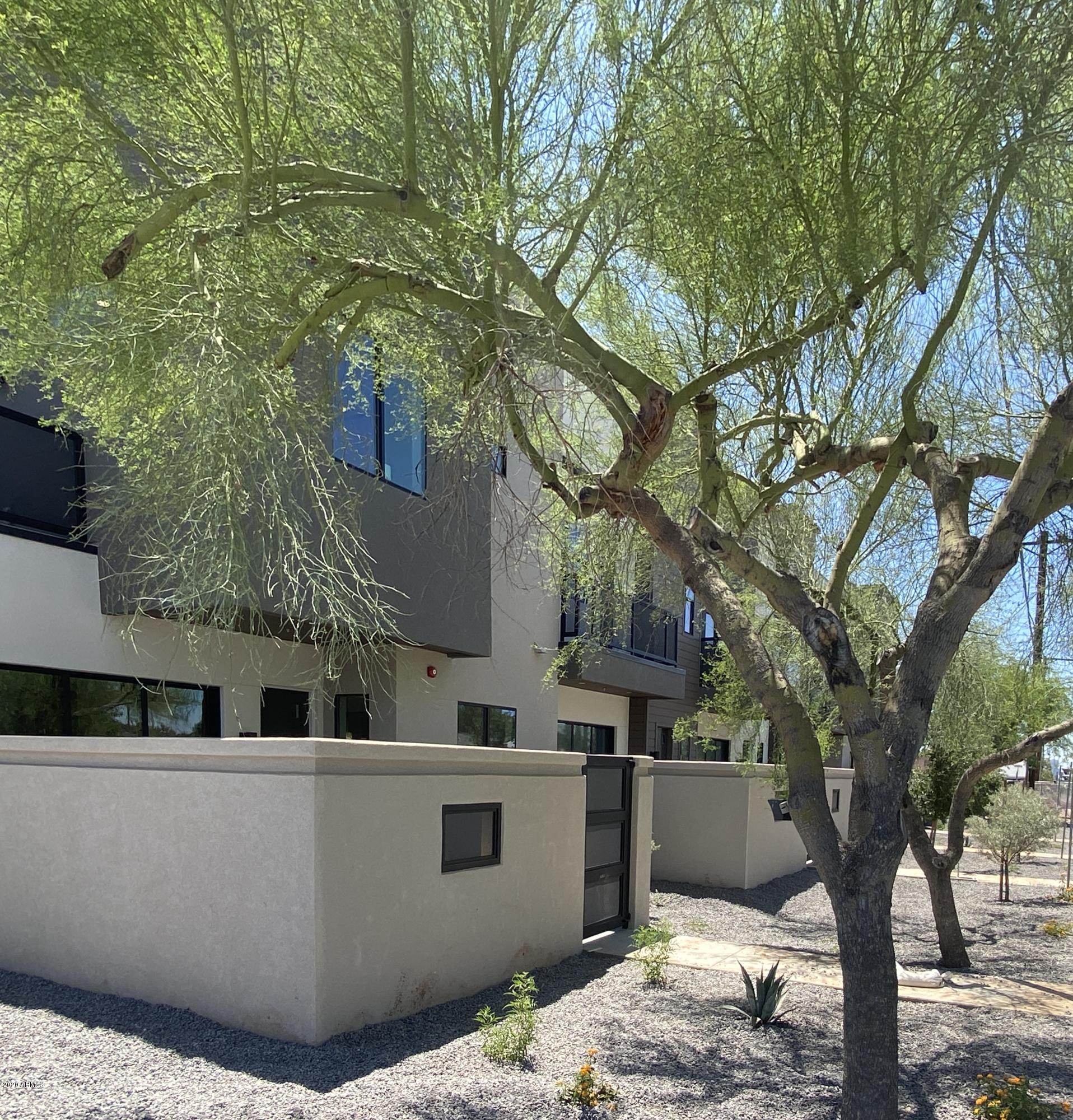 2645 East Osborn Road, Unit 6 Phoenix, AZ 85016 - Photo 39 of 43 a view of a house with a tree
