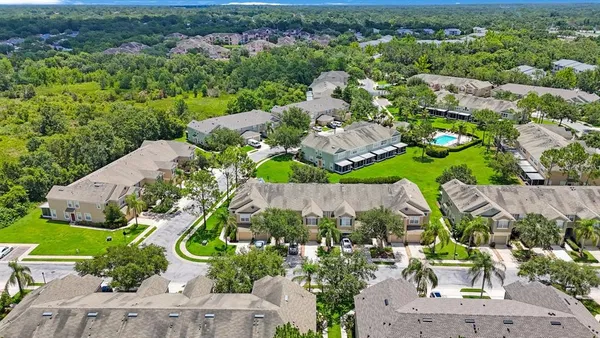an aerial view of a house with a garden