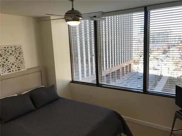 a view of a room with windows
