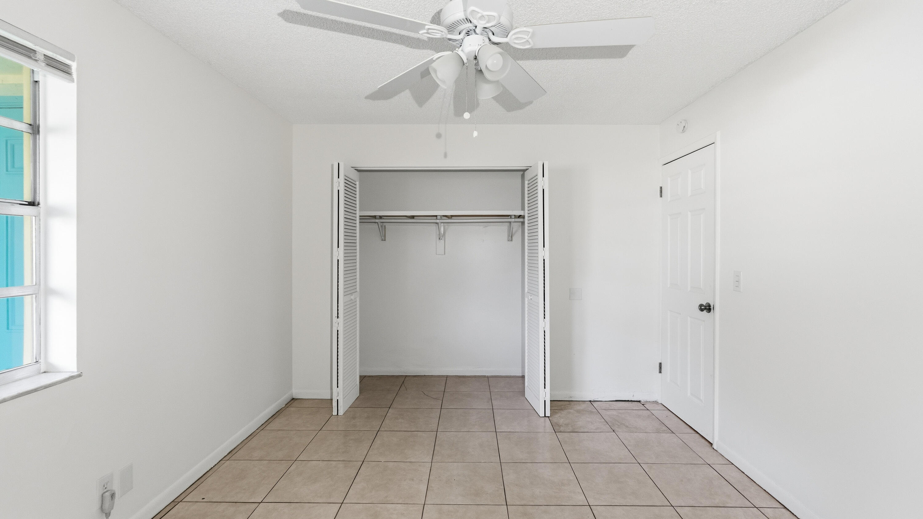 4453 Stevens Road Lake Worth Beach, FL 33461 - Photo 48 of 67 a view of an empty room with a window