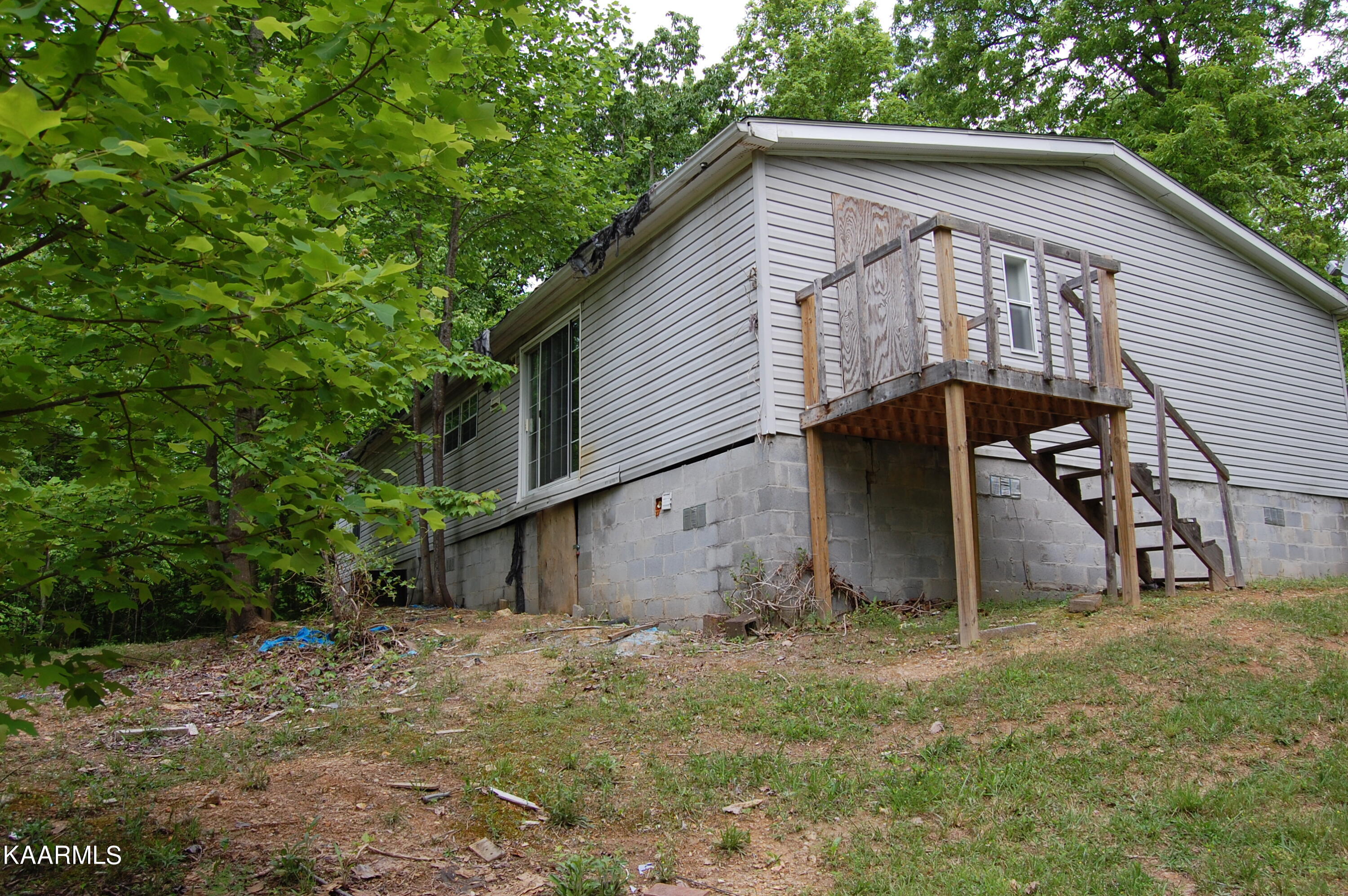 215 Autumn Lane Heiskell, TN 37754 - Photo 8 of 9 215AutumnLn-DoorSideView-MH