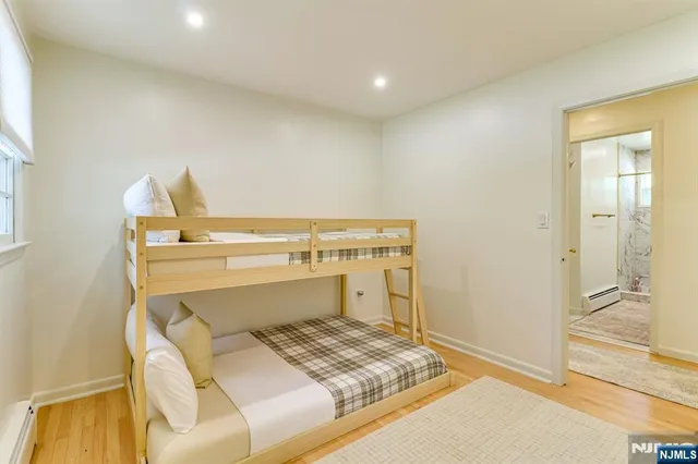 a bedroom with a bed and a cabinets