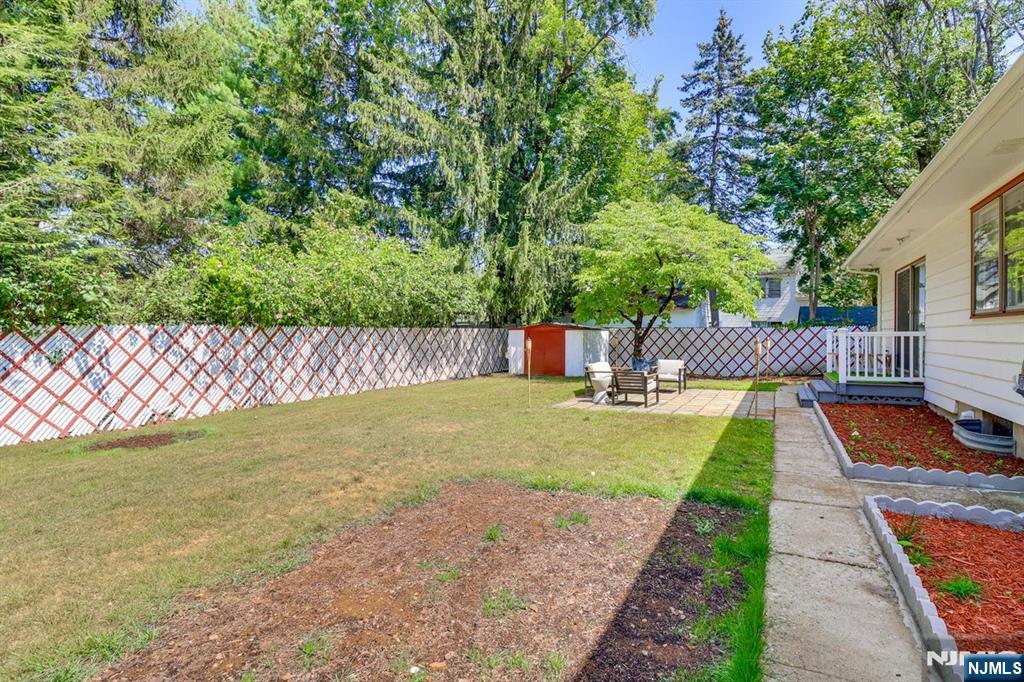 213 Haroldson Place Pompton Lakes, NJ 07442 - Photo 25 of 26 a view of yard with swimming pool and deck