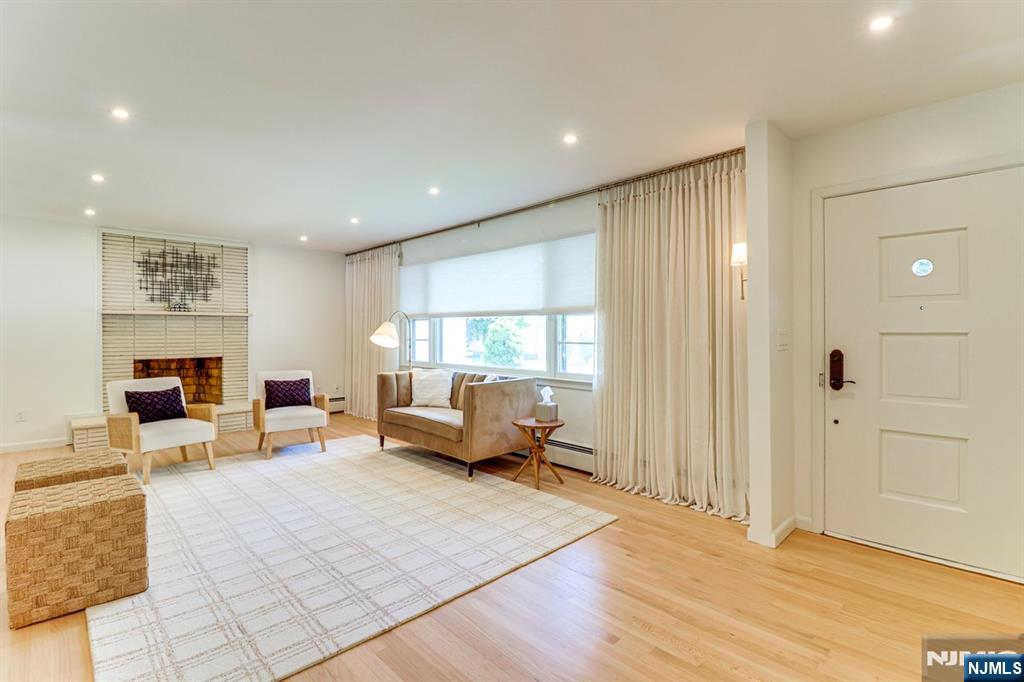 213 Haroldson Place Pompton Lakes, NJ 07442 - Photo 3 of 26 a living room with furniture window and a table