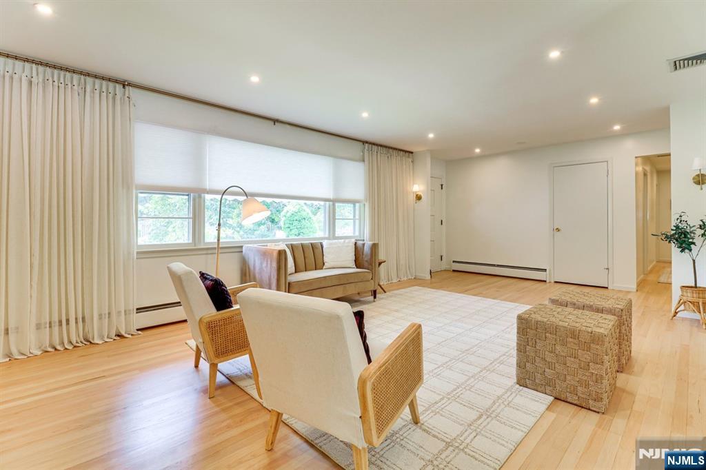 213 Haroldson Place Pompton Lakes, NJ 07442 - Photo 5 of 26 a living room with furniture and large windows