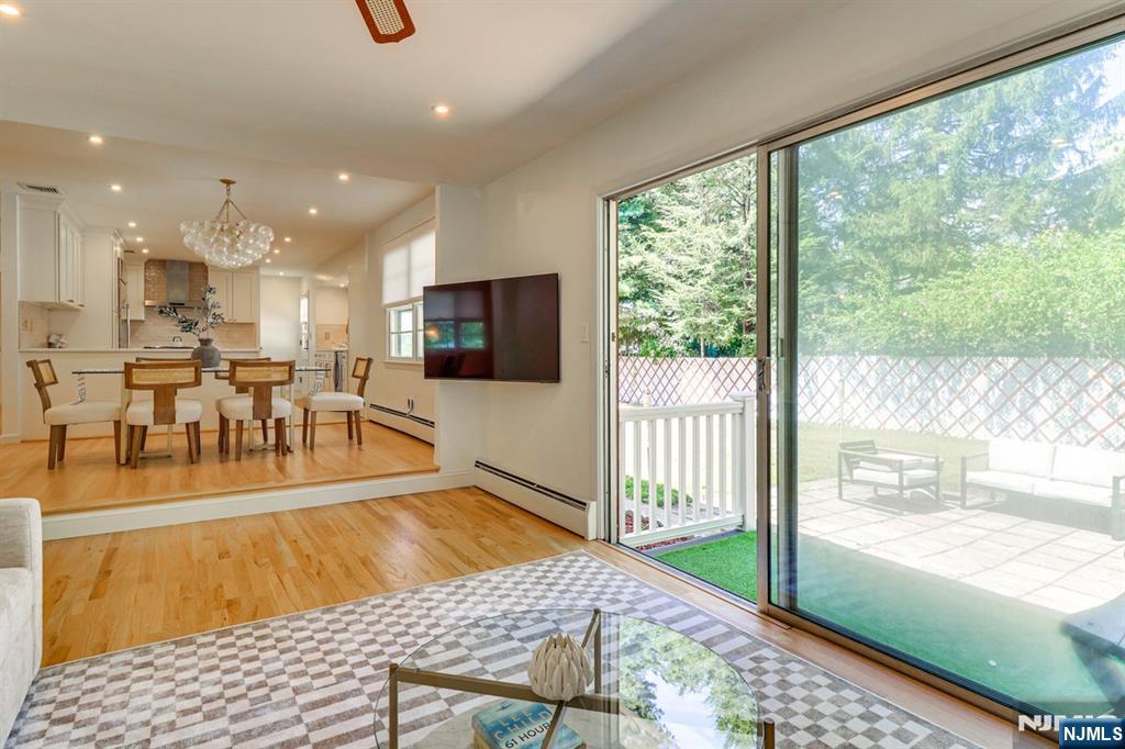213 Haroldson Place Pompton Lakes, NJ 07442 - Photo 6 of 26 a view of a living room and dining room