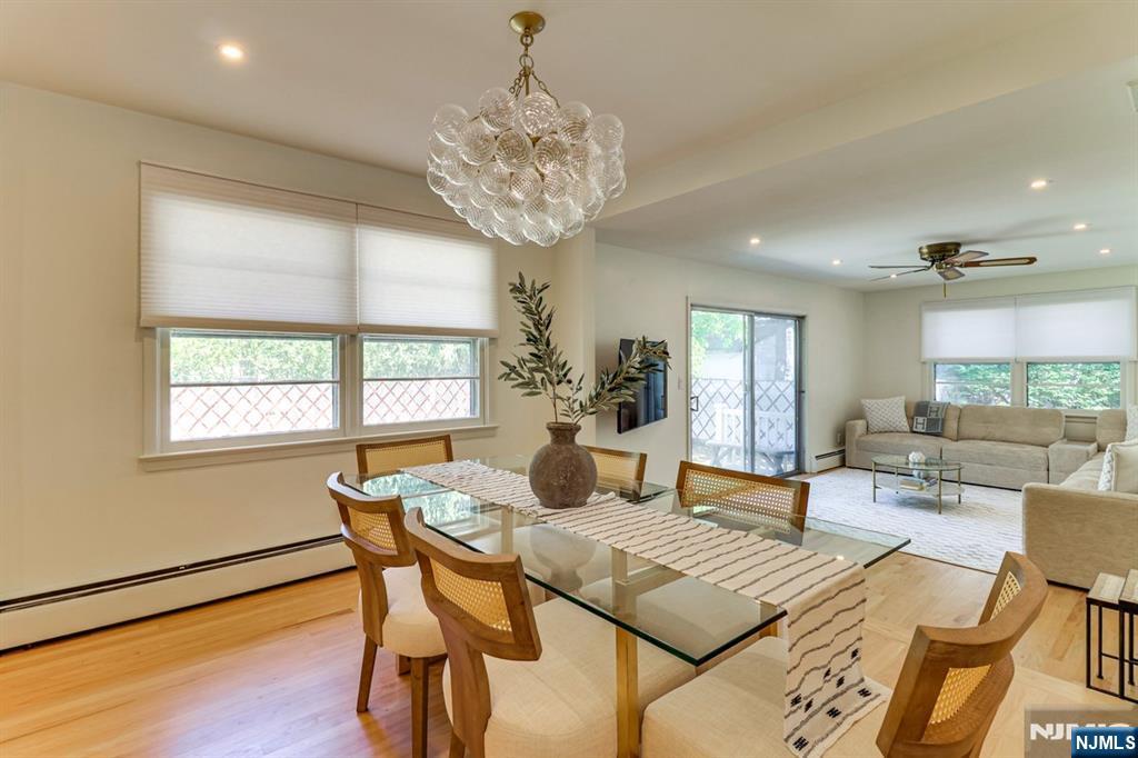 213 Haroldson Place Pompton Lakes, NJ 07442 - Photo 7 of 26 a view of a dining room with furniture window and wooden floor