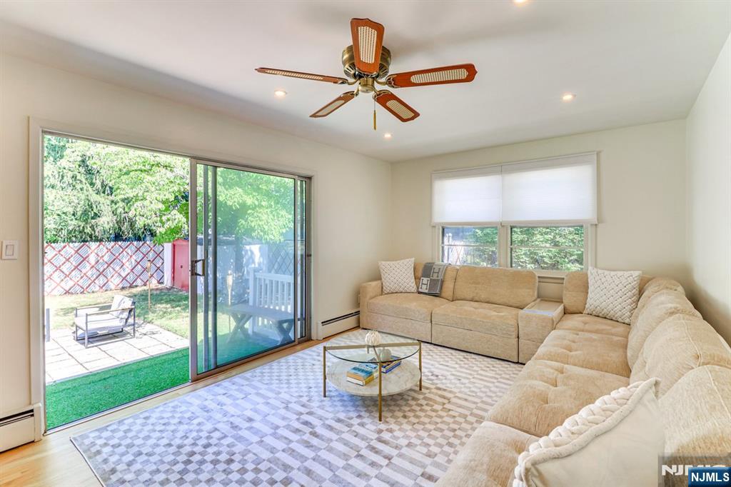 213 Haroldson Place Pompton Lakes, NJ 07442 - Photo 9 of 26 a living room with furniture and a large window