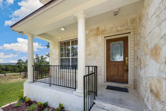a view of a balcony with a porch