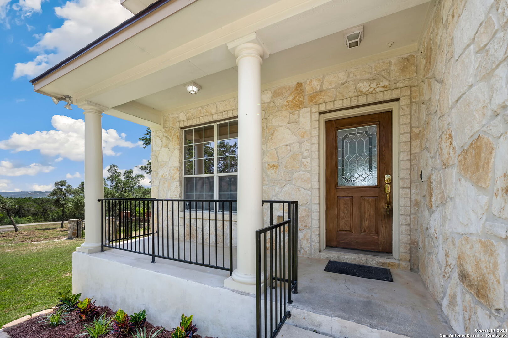 17132 Bandera Road Helotes, TX 78023 - Photo 31 of 39 a view of a balcony with a porch