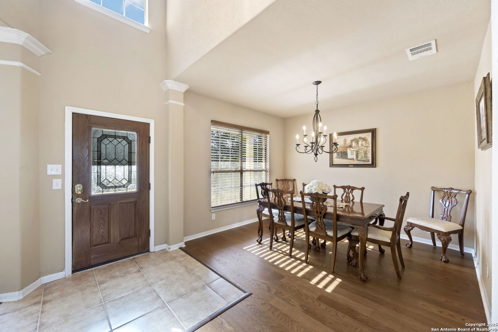 17132 Bandera Road Helotes, TX 78023 - Photo 4 of 39 a view of a dining room with furniture window and wooden floor