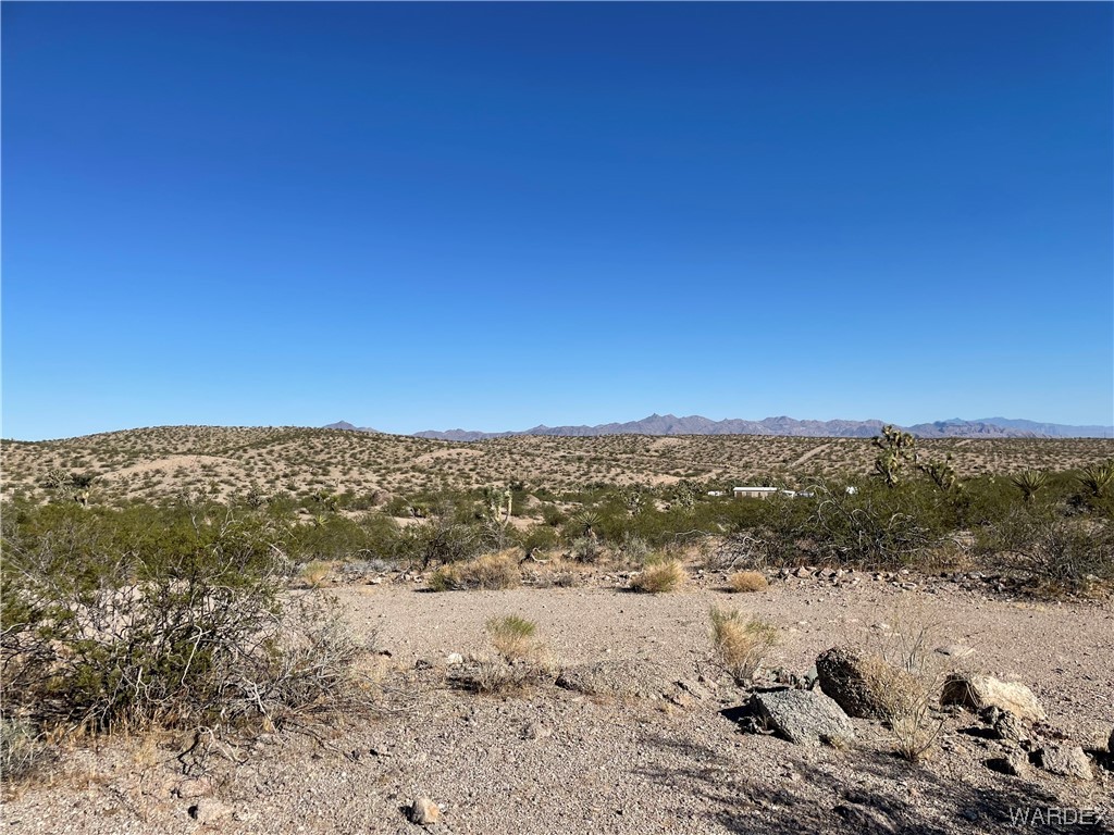 1155 Haystack Drive Meadview, AZ 86444 - Photo 1 of 12 a view of a beach with a mountain in the background