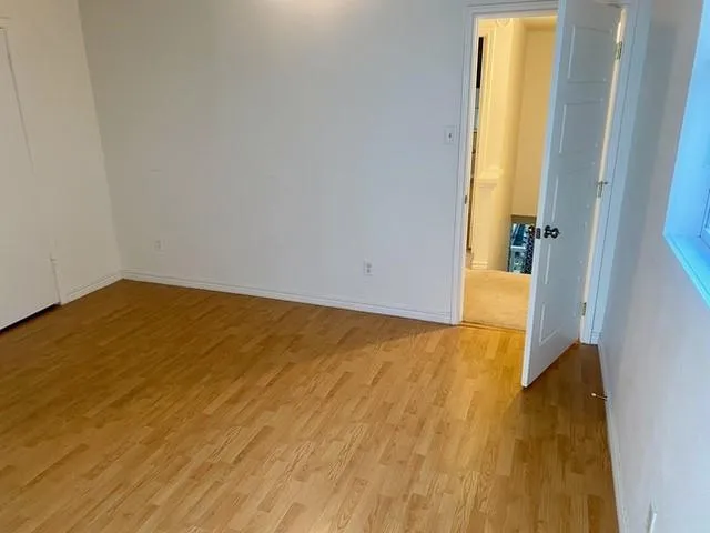 an empty room with window