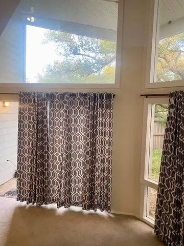 a bedroom with a bed and a stove top oven