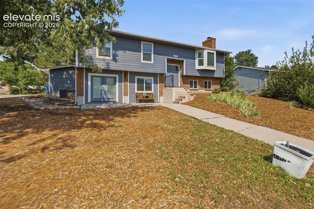 1239 Suncrest Way Colorado Springs, CO 80906 - Photo 2 of 46 Side view