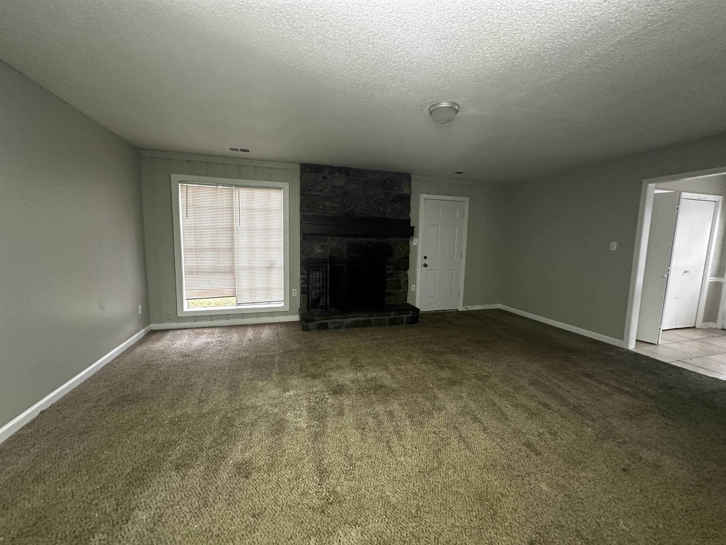 2980 Ridgeway Road Memphis, TN 38115 - Photo 2 of 7 an empty room with windows