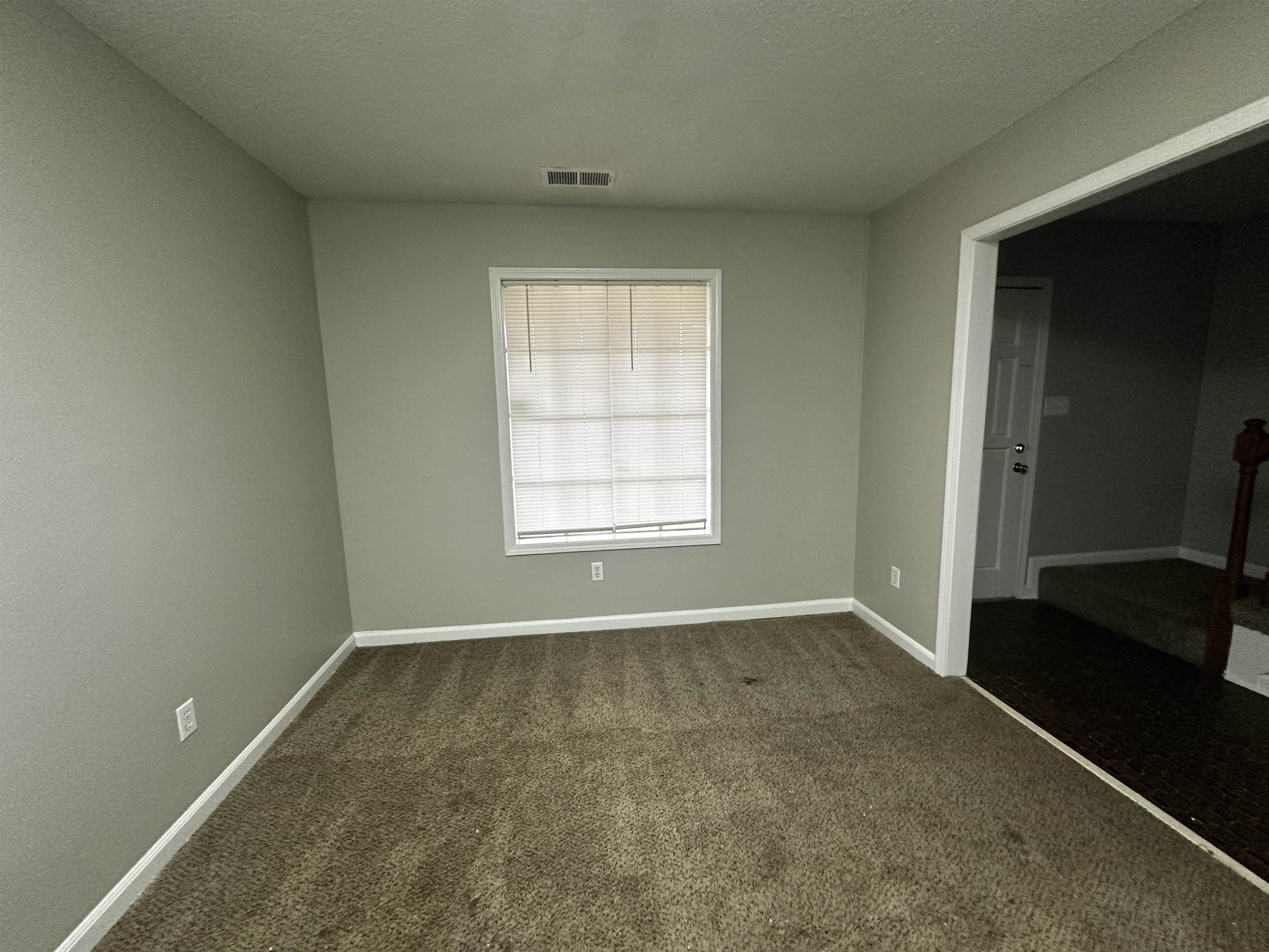 2980 Ridgeway Road Memphis, TN 38115 - Photo 3 of 7 an empty room with a window