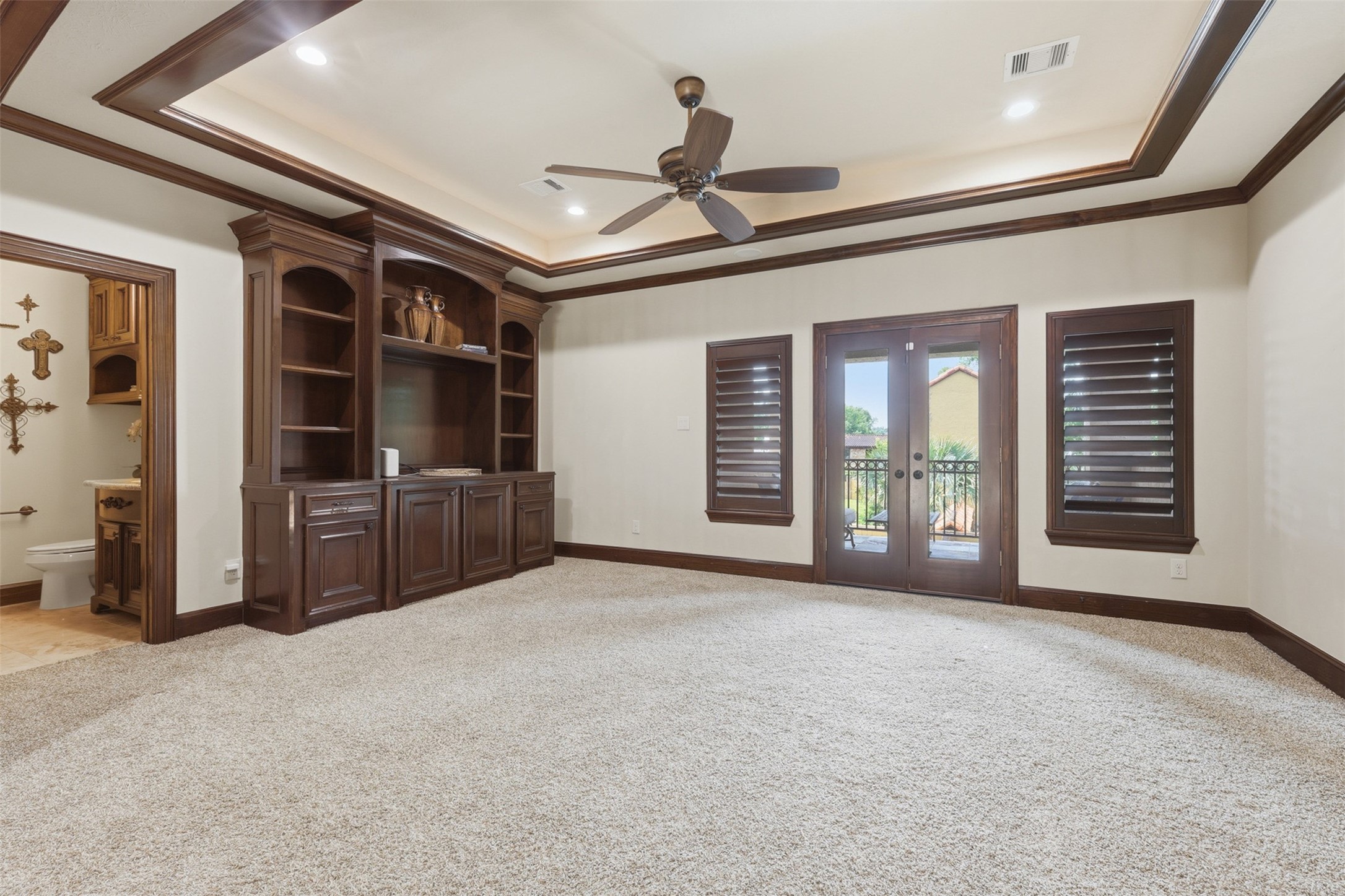 14 Post Shadow Estate Drive Spring, TX 77389 - Photo 25 of 49 a view of an empty room with a fireplace and windows