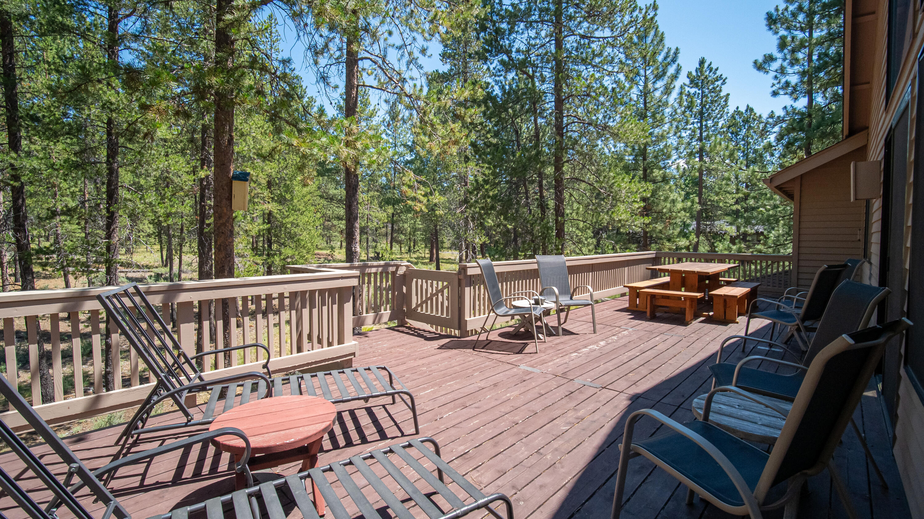 17932 Rhododendron Lane Sunriver, OR 97707 - Photo 15 of 32 The deck is large with access to the lower level.