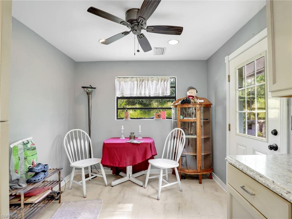 210 25th Street Southwest Naples, FL 34117 - Photo 13 of 33 Dining room with healthy amount of natural light, a ceiling fan, and recessed lighting