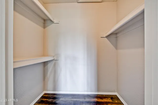 a view of small space with racks on the wall