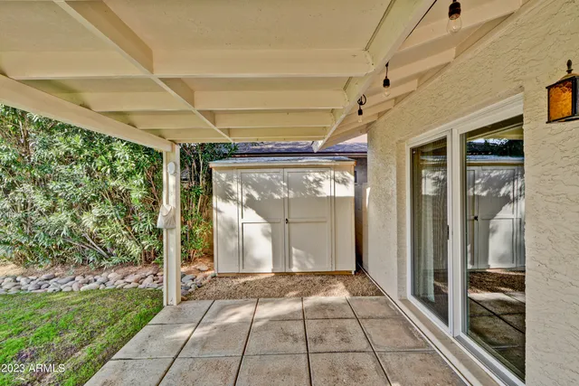 a view of a room with a large window