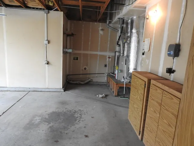 a view of tree in front of a house