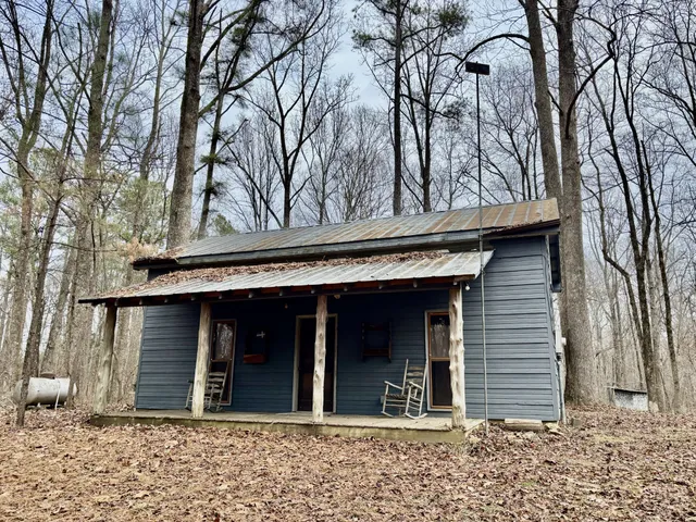 a view of a backyard of the house