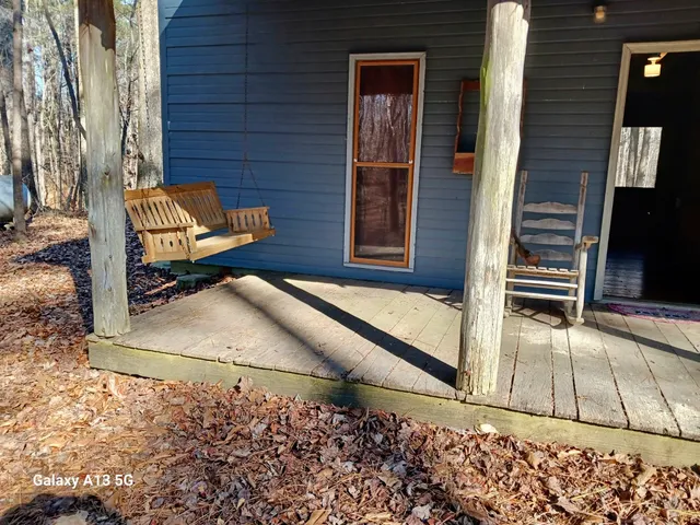 a view of a backyard of the house