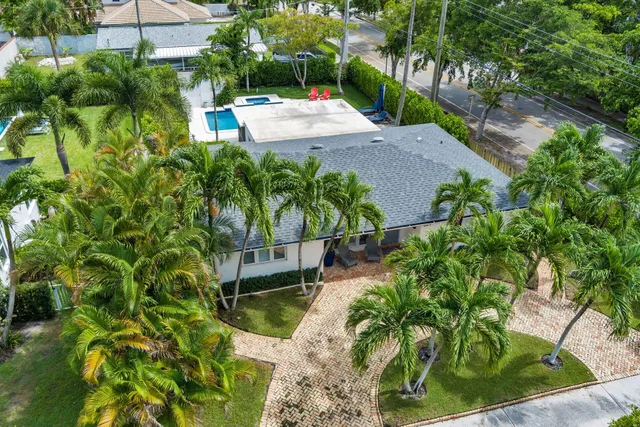 a backyard of a house with lots of green space