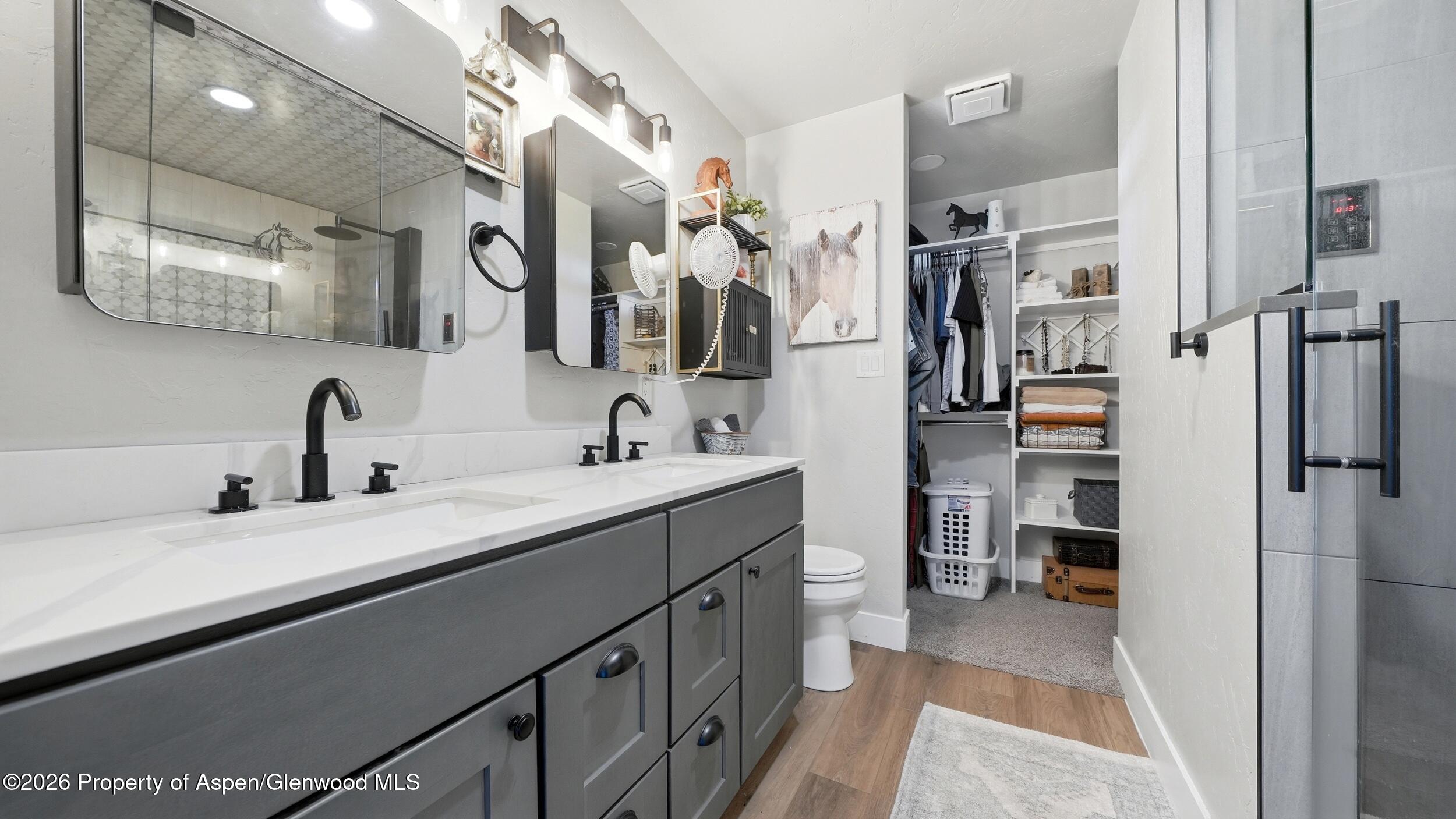 445 South Camp Road Grand Junction, CO 81507 - Photo 20 of 37 a bathroom with a double vanity sink mirror and double