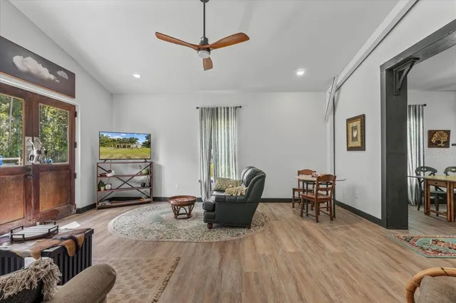 a bathroom with a sink vanity and toilet