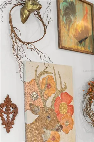 a vase of flowers sitting on a table