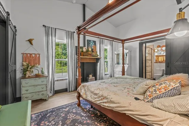 a view of a house with a yard and swimming pool