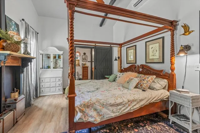 a house view with swimming pool in front of it