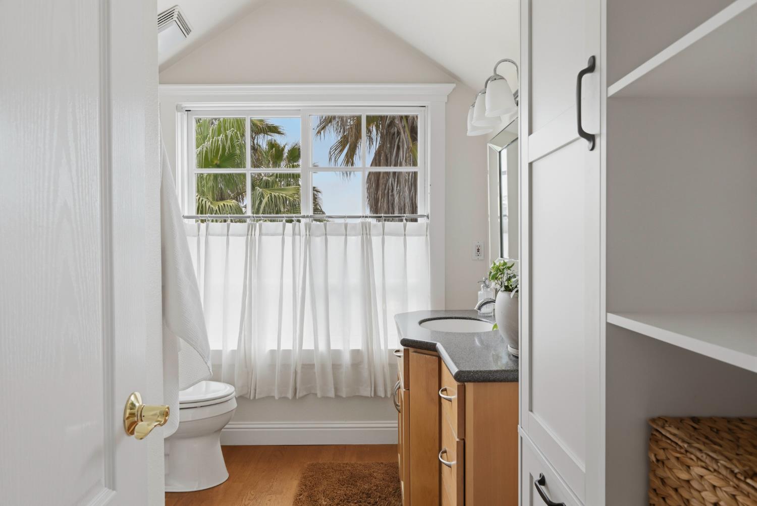 10120 Shenandoah Road Plymouth, CA 95669 - Photo 52 of 86 a bathroom with a toilet a sink and a window