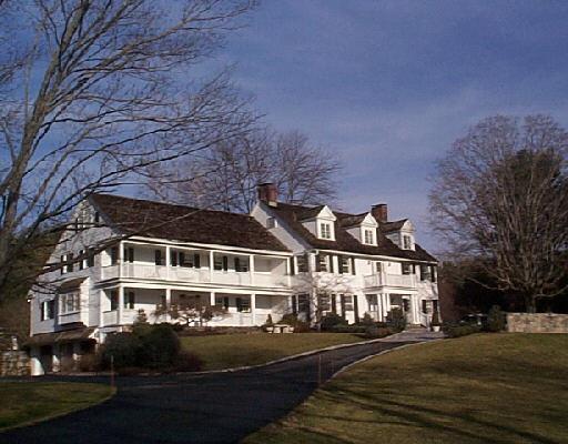 117 Middlebrook Farm Road Wilton, CT 06897 - Photo 1 of 1 a front view of residential houses with yard