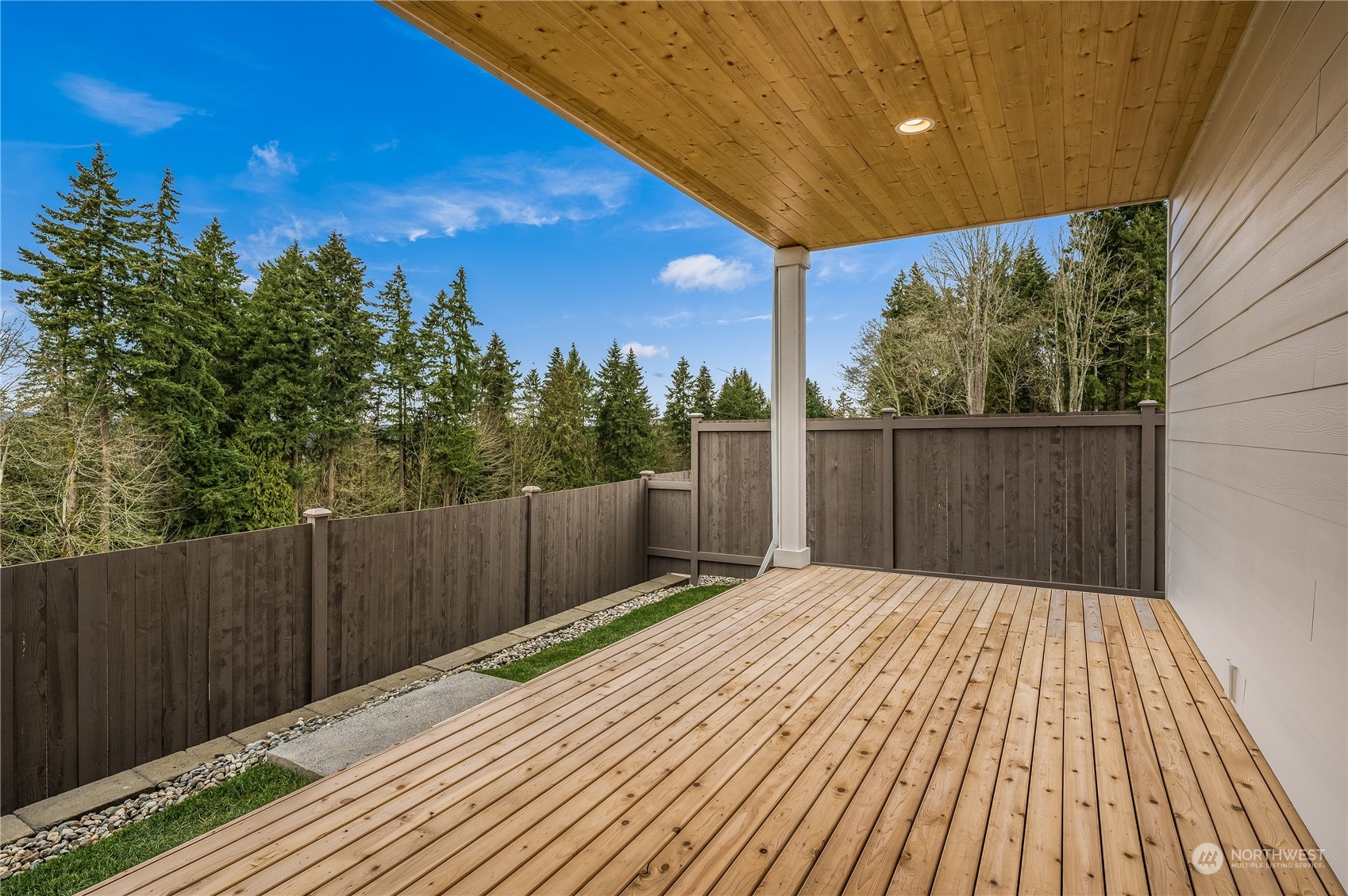 4321 243rd Place Southeast, Unit LOT31 Bothell, WA 98021 - Photo 17 of 35 a balcony with wooden floor