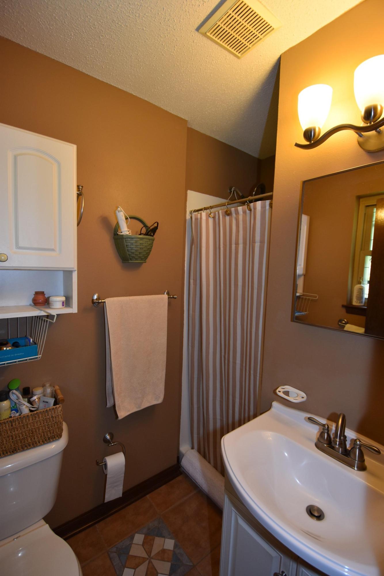 6008 Old Hickory Road Crestview, FL 32539 - Photo 23 of 57 a bathroom with a sink and a toilet