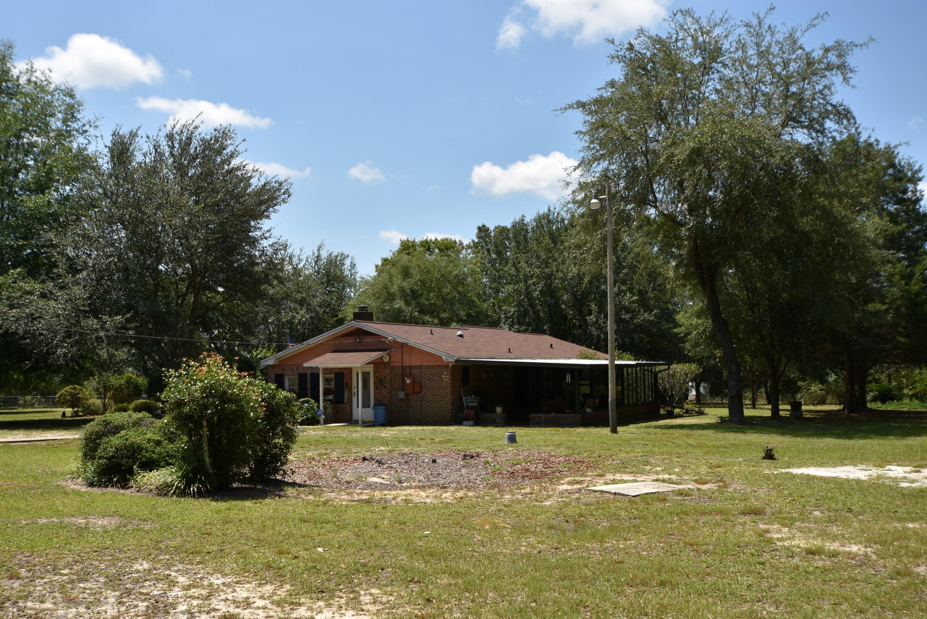 6008 Old Hickory Road Crestview, FL 32539 - Photo 57 of 57 a front view of a house with a yard