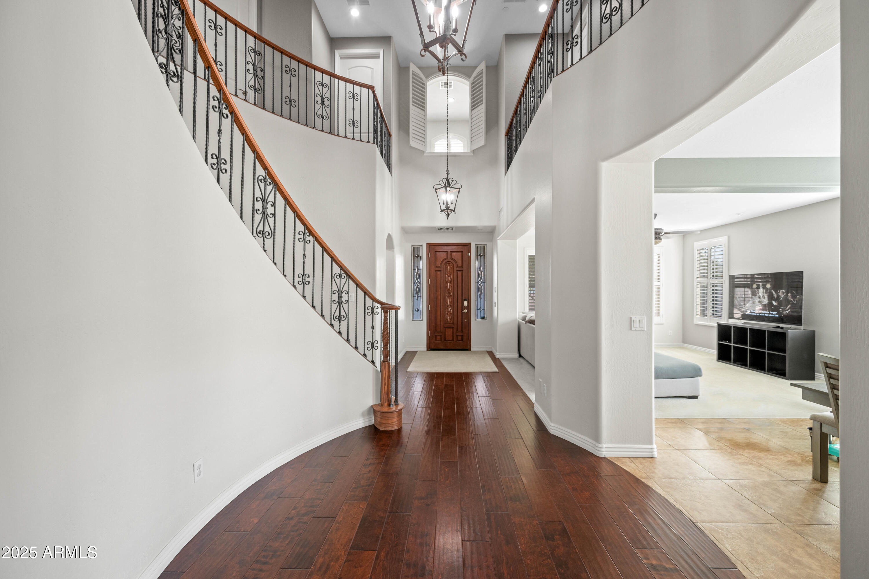 16880 West Jackson Street Goodyear, AZ 85338 - Photo 2 of 86 a view of entryway and hall with wooden floor