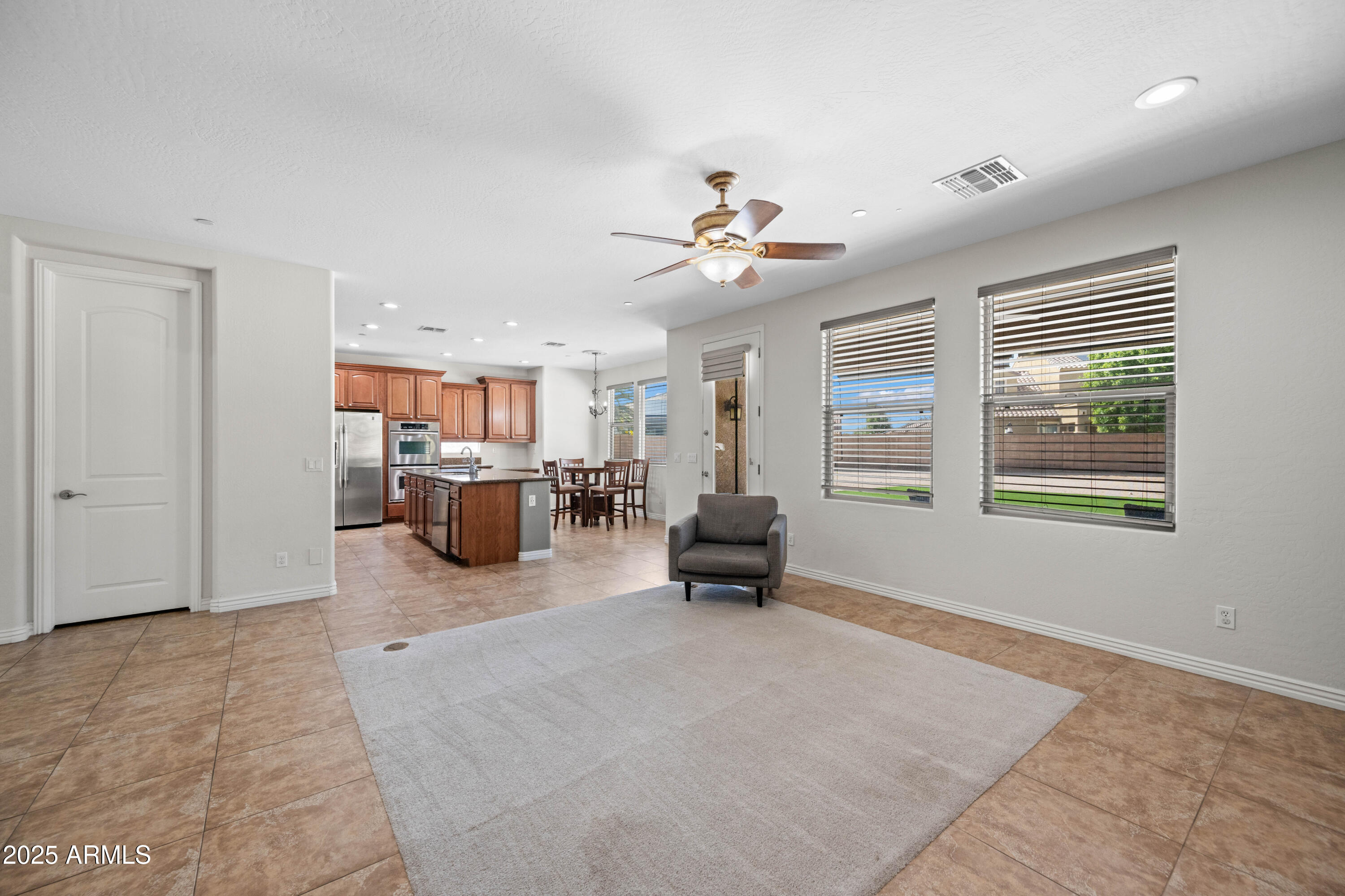 16880 West Jackson Street Goodyear, AZ 85338 - Photo 33 of 86 a living room with furniture and a window