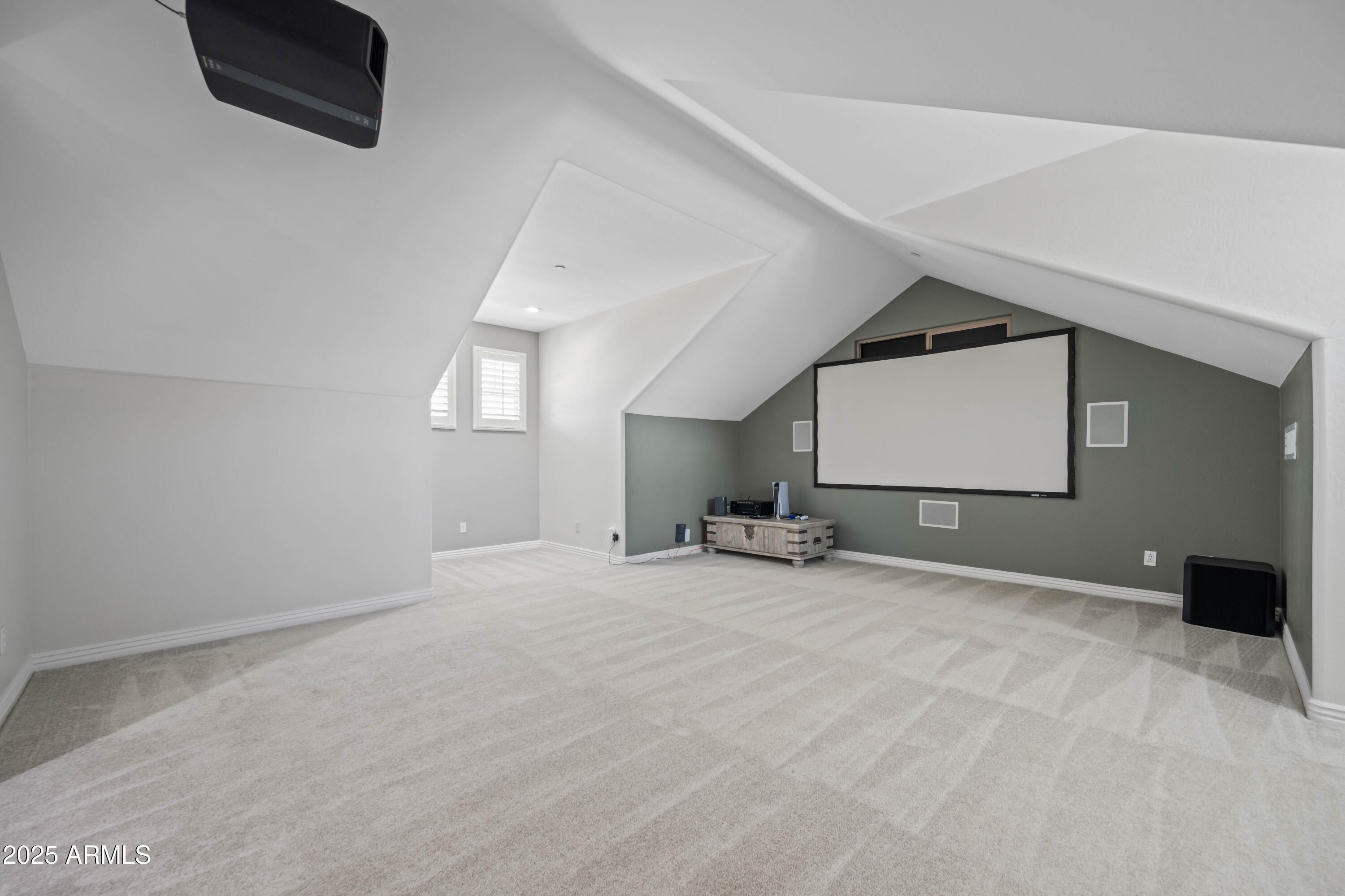 16880 West Jackson Street Goodyear, AZ 85338 - Photo 44 of 86 a view of a livingroom with wooden floor and window