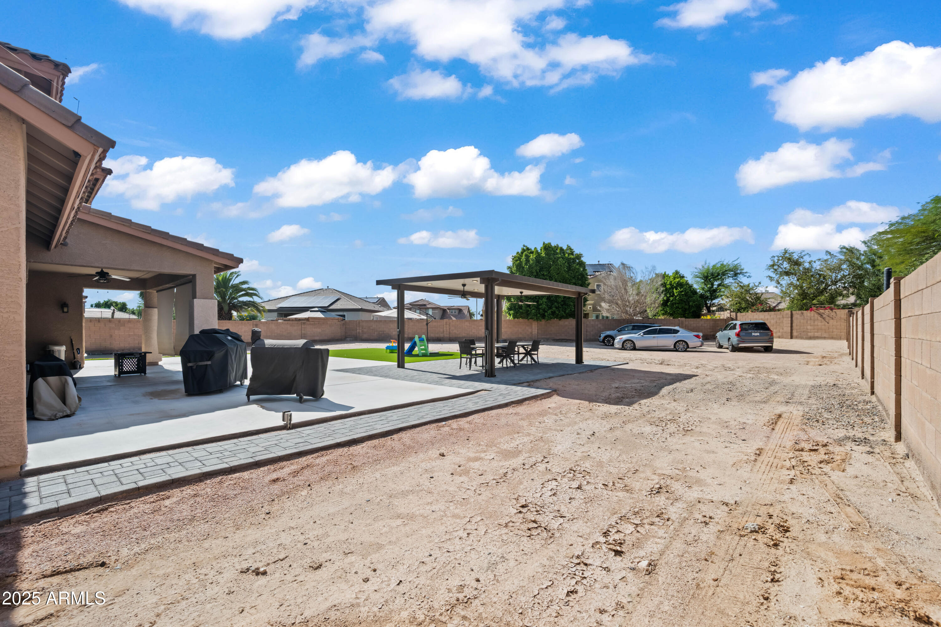 16880 West Jackson Street Goodyear, AZ 85338 - Photo 79 of 86 a view of a street with cars