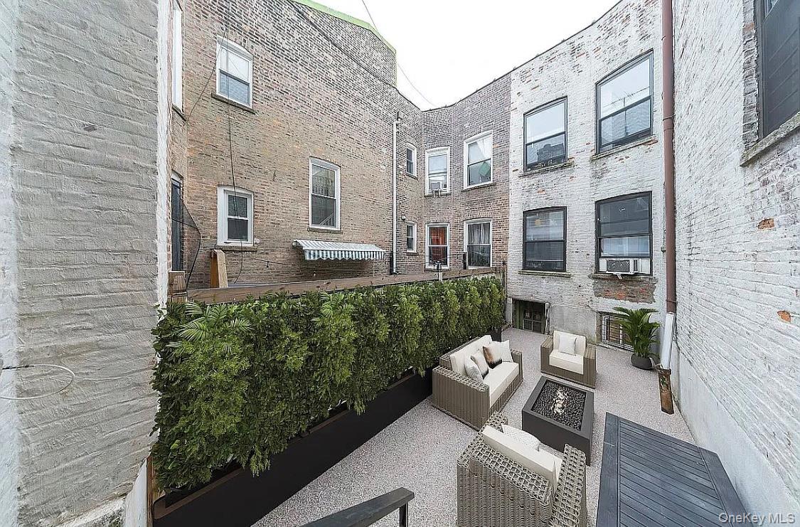 372 Rutland Road Brooklyn, NY 11225 - Photo 6 of 10 View of patio featuring an outdoor living space