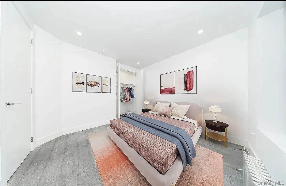 372 Rutland Road Brooklyn, NY 11225 - Photo 8 of 10 Bedroom with wood finished floors and a closet