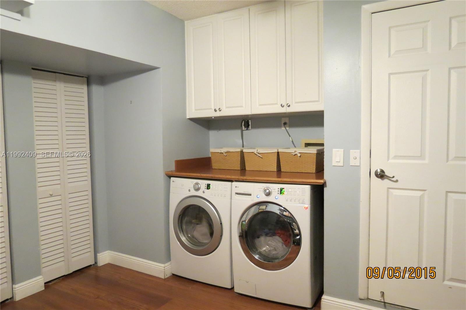 11841 Southwest 94th Street Miami, FL 33186 - Photo 12 of 19 a utility room with dryer and washer
