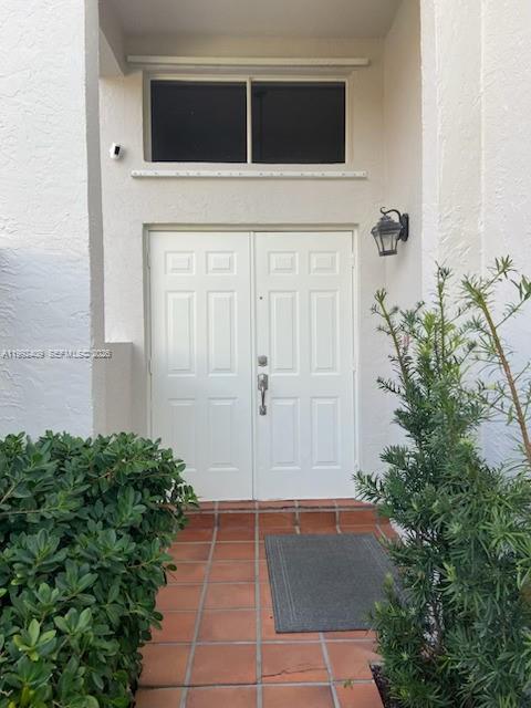11841 Southwest 94th Street Miami, FL 33186 - Photo 2 of 19 a view of a entryway door of the house
