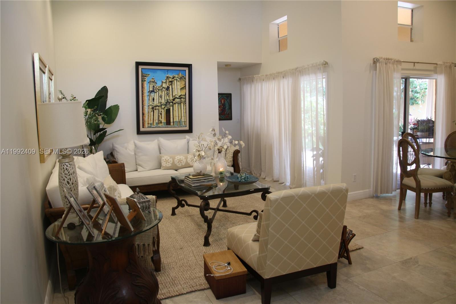 11841 Southwest 94th Street Miami, FL 33186 - Photo 3 of 19 a living room with furniture and wooden floor