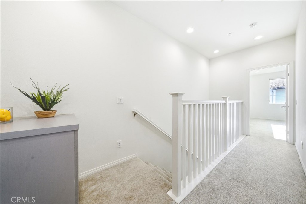 11130 Legion Loop, Unit 105 El Monte, CA 91731 - Photo 18 of 49 a view of a hallway to a window